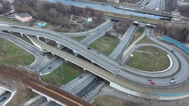 Flight over road junction in big city