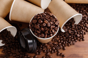Coffee beans with paper cups