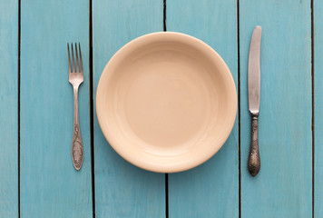 cutlery on wooden table