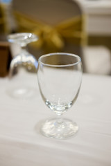 Glass of water on a table in the meeting room.