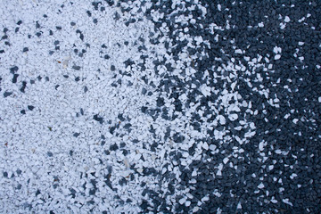 Bright background with black and white stones.