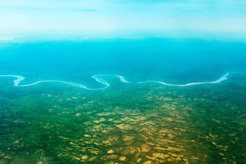 Fototapeta na wymiar South American river from the plane