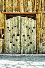 Very old wooden barn gate