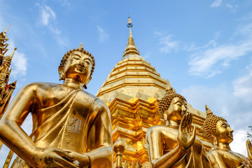 Fototapeta premium Golden Buddha statue in Wat Phra That Doi Suthep is tourist attraction of Chiang Mai, Thailand.Asia.