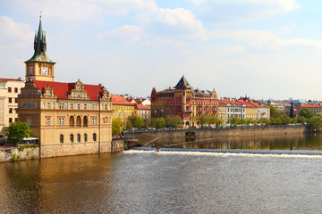 Fototapeta na wymiar Old Town ancient architecture and Vltava river pier in Prague