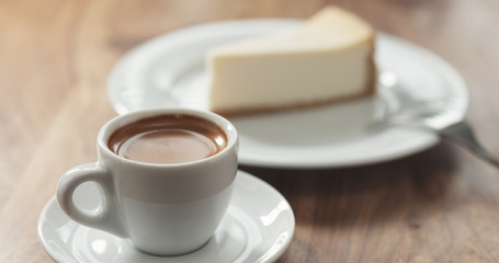 Obraz na płótnie Canvas espresso and cheesecake on table