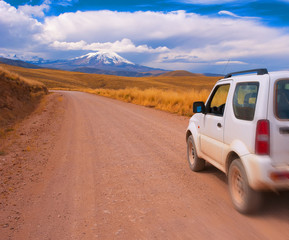 Obraz na płótnie Canvas The jeep racing down the road to the volcano. Peru. South America.
