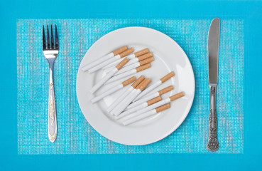 Cigarettes on a plate