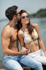 Fototapeta premium happy couple in love on river,shallow depth of field