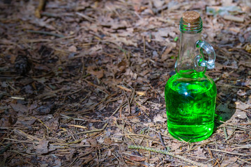 Green herbal potion Herbal elixir. Magic Potion. Homeopathic medicine.