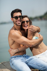 Fototapeta premium happy couple in love on river,shallow depth of field