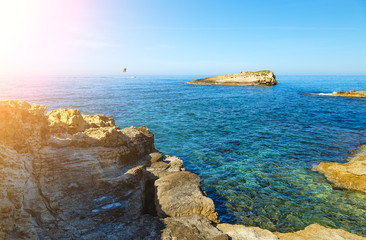 Fototapeta na wymiar Wonderful sea lagoon with clear turquoise water on bright sunny day looks like paradise.