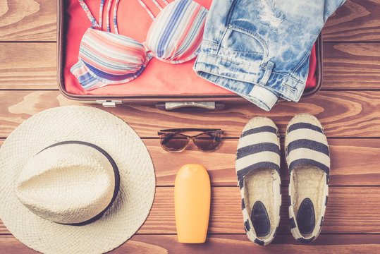 Open Bag With Beach Accessories And Clothes