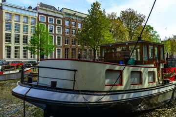 Fototapeta na wymiar Amsterdam, Holland: Spring sunny day in the city