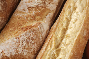 Bread texture background, closeup of baguette loaf