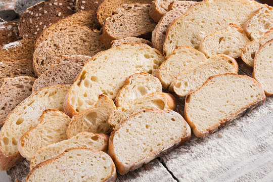 Bakery concept. Plenty of sliced bread background