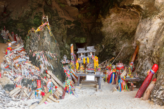 Wooden penis in Princess cave (Phra Nang Shrine Temple). South Railay beach in Krabi. Thailand.