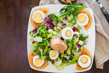 Fresh summer salad with eggs and tuna