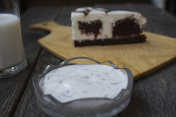 cake and milk on a wooden table