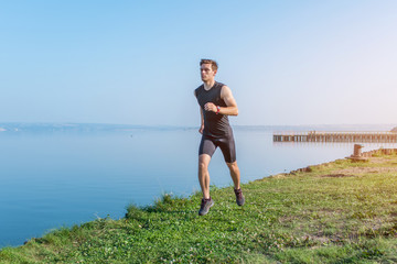 Young jogger running in morning Athlete runner working out cardio.