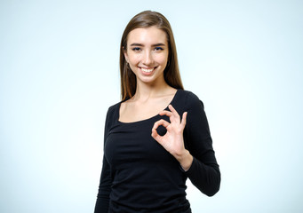 Success woman showing thumbs up gesture