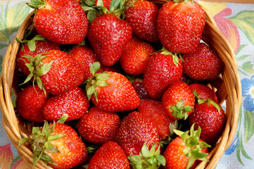 Bright fresh strawberry in a round container