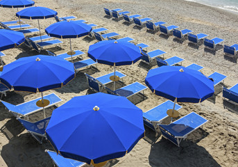Vacation and Tourism concept. Sunbeds on the paradise beach