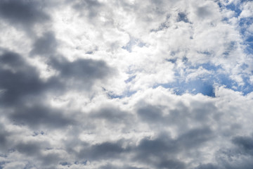 White clouds running over sky