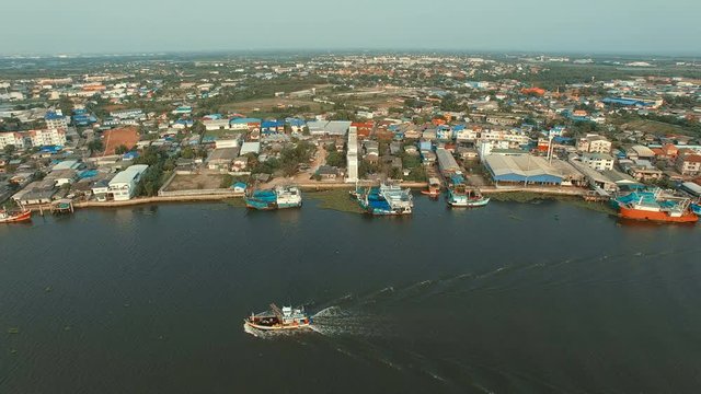aerial view of fishery boat running in tha chin river mahachai samuthsakorn thailand