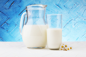 Milk jug and glass milk - healthy lifestyle concept