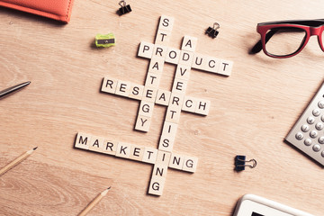 Conceptual business keywords on table with elements of game maki