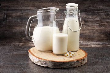 Milk jug and glass milk - healthy lifestyle concept