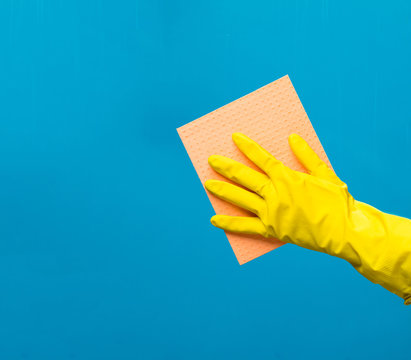 Man wiping window with rag