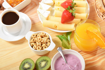 juice and coffee and yogurt with forest fruit