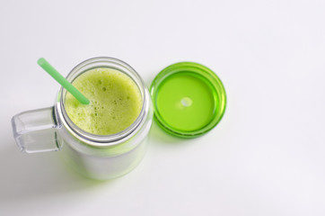 Cup with smoothie with lid