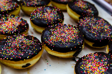 Donuts with chocolate and colorful Topping.