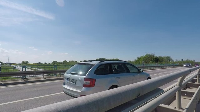 time lapse of traffic on a german highway on a sunny day - dolly shot - camera sliding