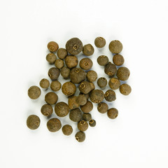 Beads of allspice isolated on a white background