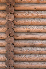 The wall of a wooden house from calibrated logs