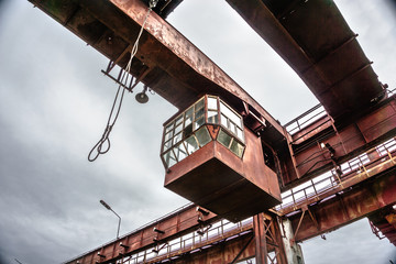 Rusty cockpit industrial crane 