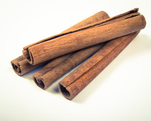 Cinnamon sticks isolated on white background.