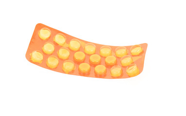 Pills in a package isolated on white background. 