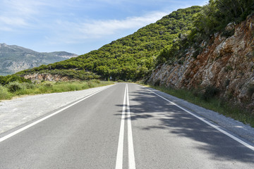 The road on a background of mountains