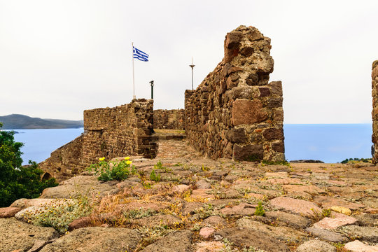 The castle of Molivos Castle on the island of Lesbos above the town of Molyvos in Greece. Molyvos Castle stone steps and wall.