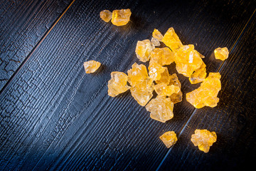 Crystals of yellow sugar.