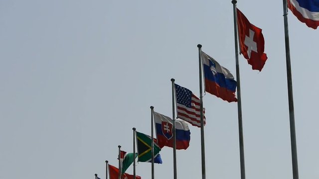 Many national flags fluttering in wind.American-flag.