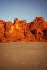 Western Australia – rocky coastline with orange colored rocks at Dampier Peninsula