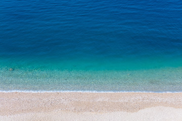 Top aerial view of empty beauty beach in Italy, Europe