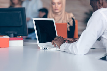 Arabic business woman wearing hijab,working in startup office.