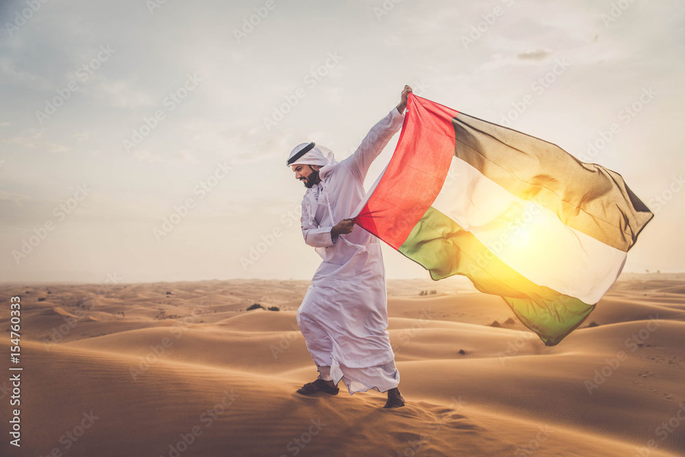 Wall mural Arabic man in the desert